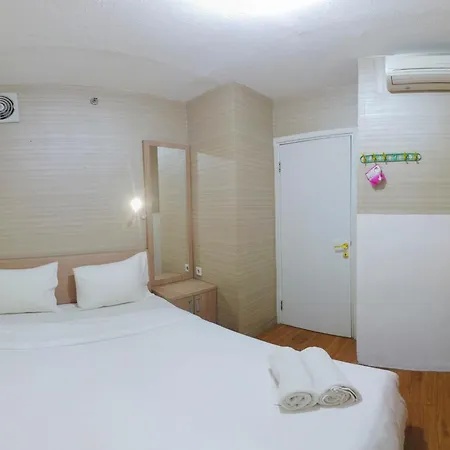 Minimalist And Combine 2Br At Green Pramuka City Apartment By Travelio